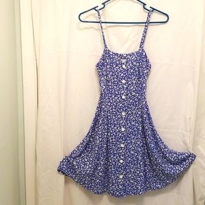 Chambray blue & white spaghetti strap mini dress. Button down front